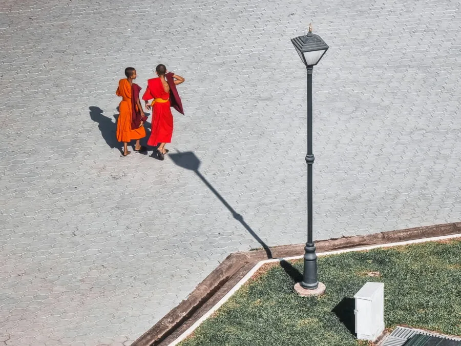 monks carry victory patuxai vientiane laos