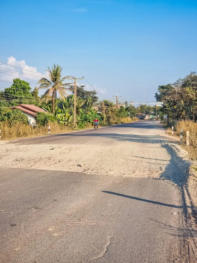 potholed road near Vientiane, Laos