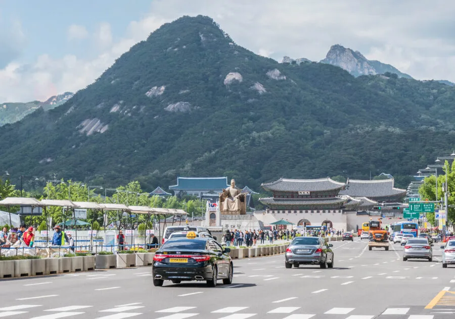 Gyeongbokgung palace entrance and seoul mountain background