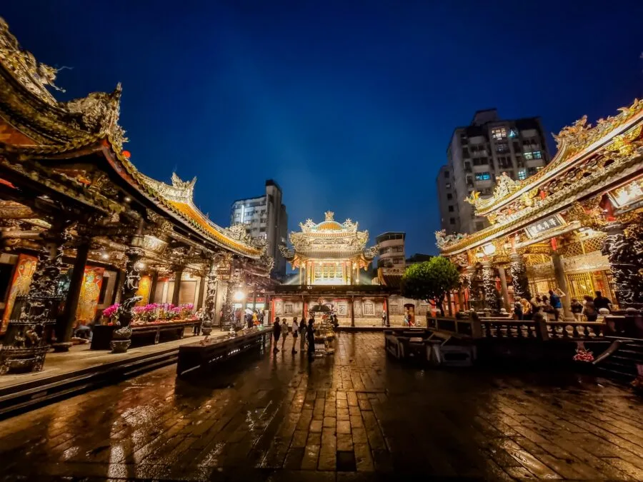 courtyard longshan temple at night taipei