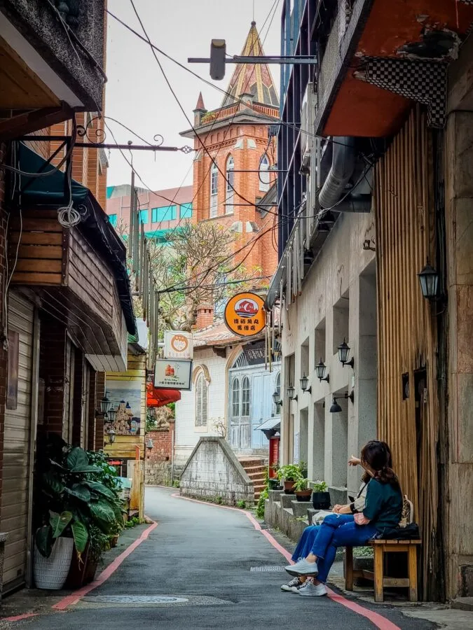 alley with view of tamsui church new taipei taiwan