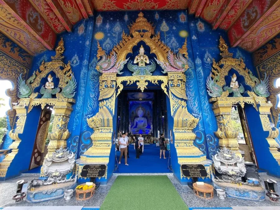entrance viharn wat rong suea ten blue temple chiang rai