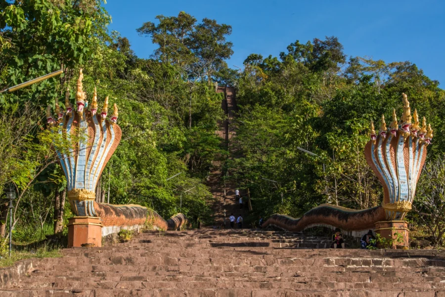 staircase lined with nagas wat phousalao paksé laos