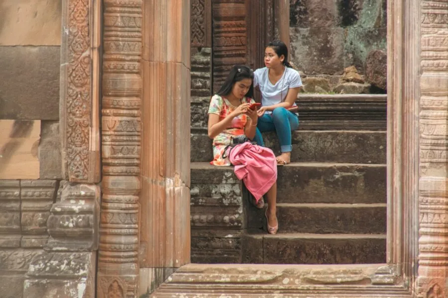 Laotian women on the steps of the South Palace of Wat Phou