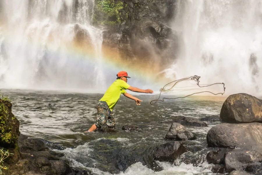 fisherman at the foot of Tad Yuang, Bolovens Plateau, Laos