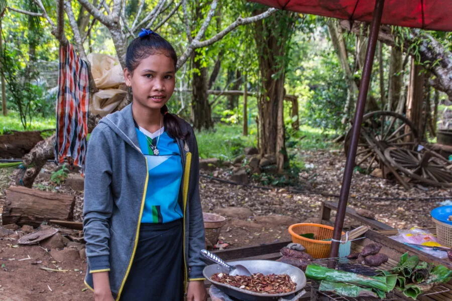 saleswoman Pha Suam waterfall Bolovens plateau Laos