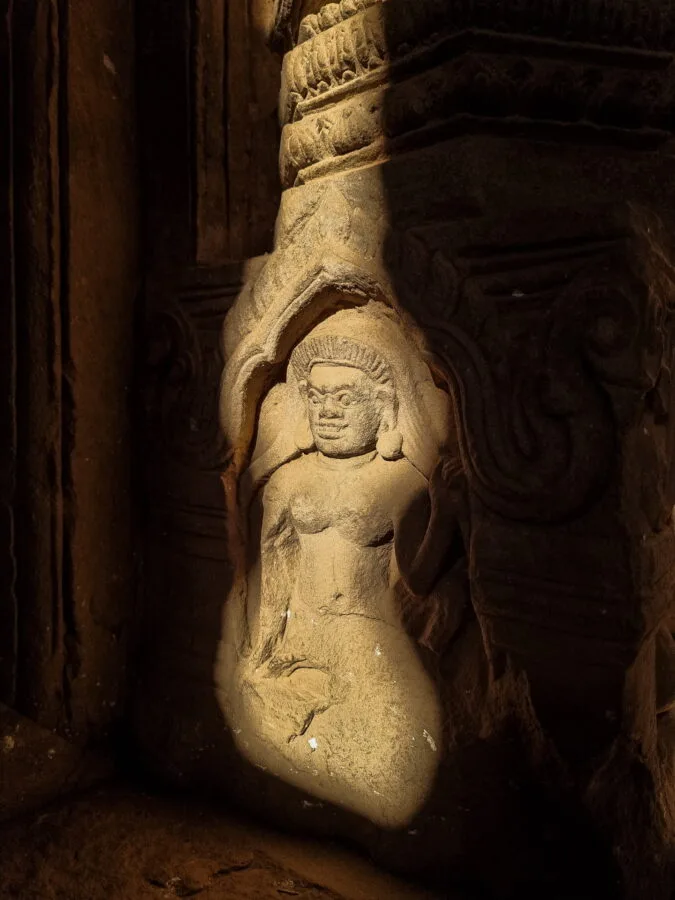 light and shadow on Khmer temple sculpture in Thailand