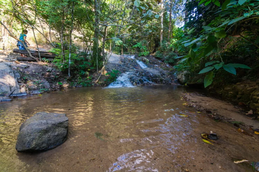 small waterfall behind ubosot at wat khantha phueksa ban mae kampong